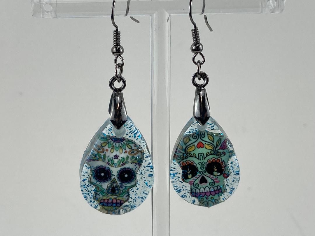 Earrings with Sugar skull charms and blue glitter