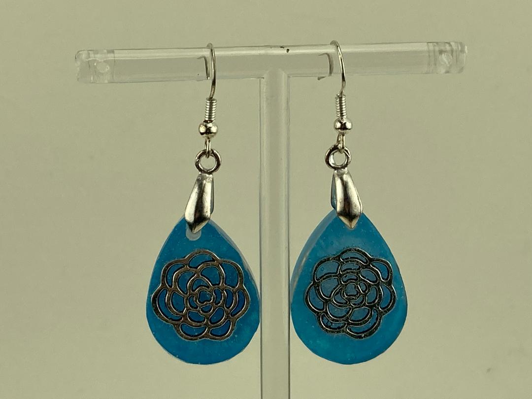 Rose outline in blue epoxy resin earrings