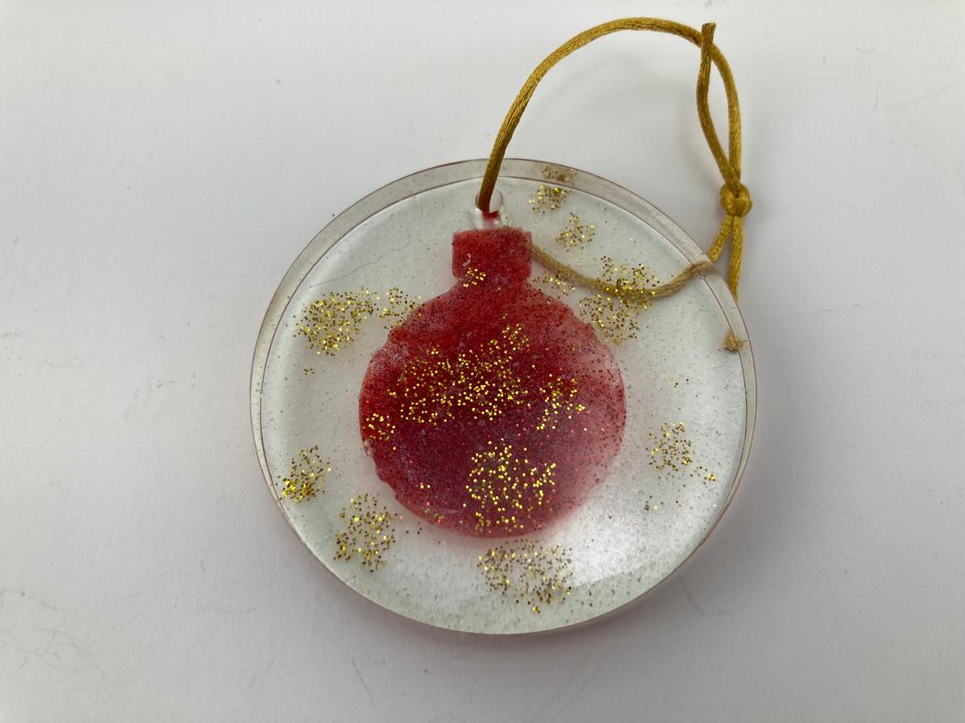 Red Christmas Ornament in Clear Round ornament with glitter