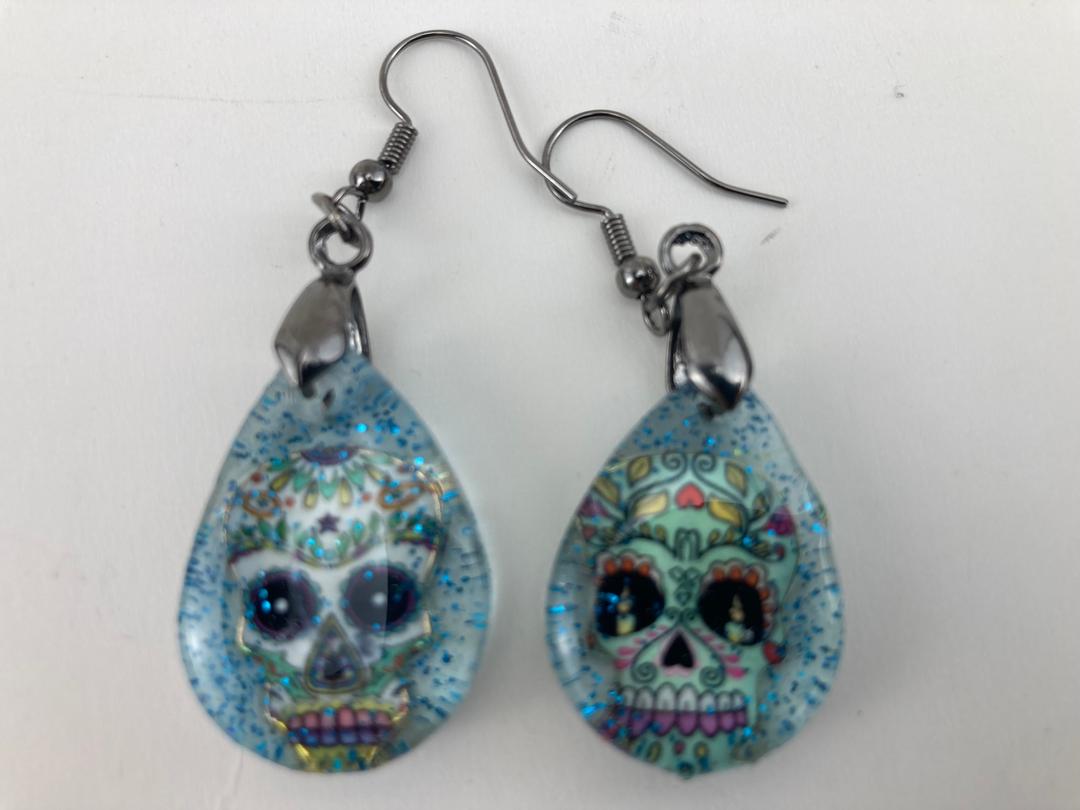 Earrings with Sugar skull charms and blue glitter